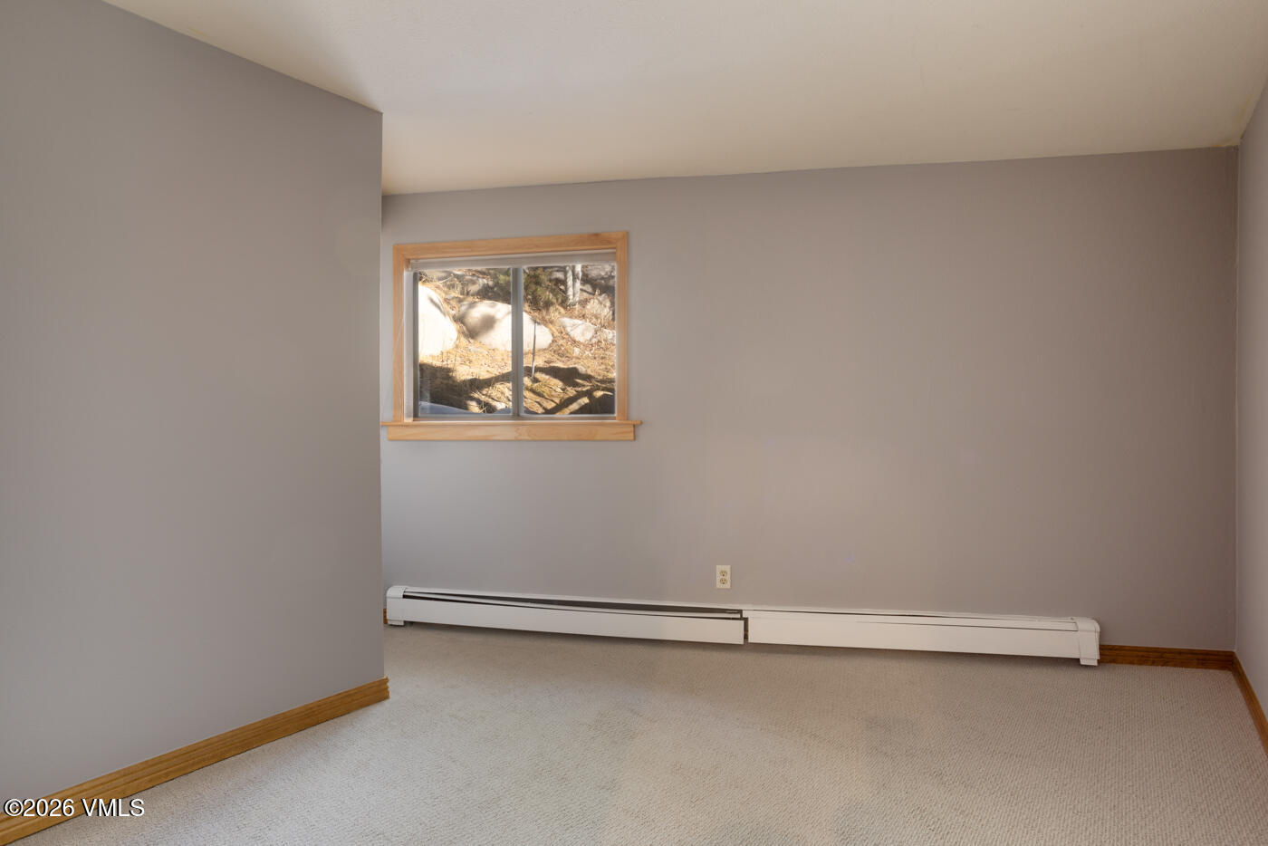 1400 Lions Ridge Loop, Unit A1 Vail, CO 81657 - Photo 24 of 41 an empty room with a window