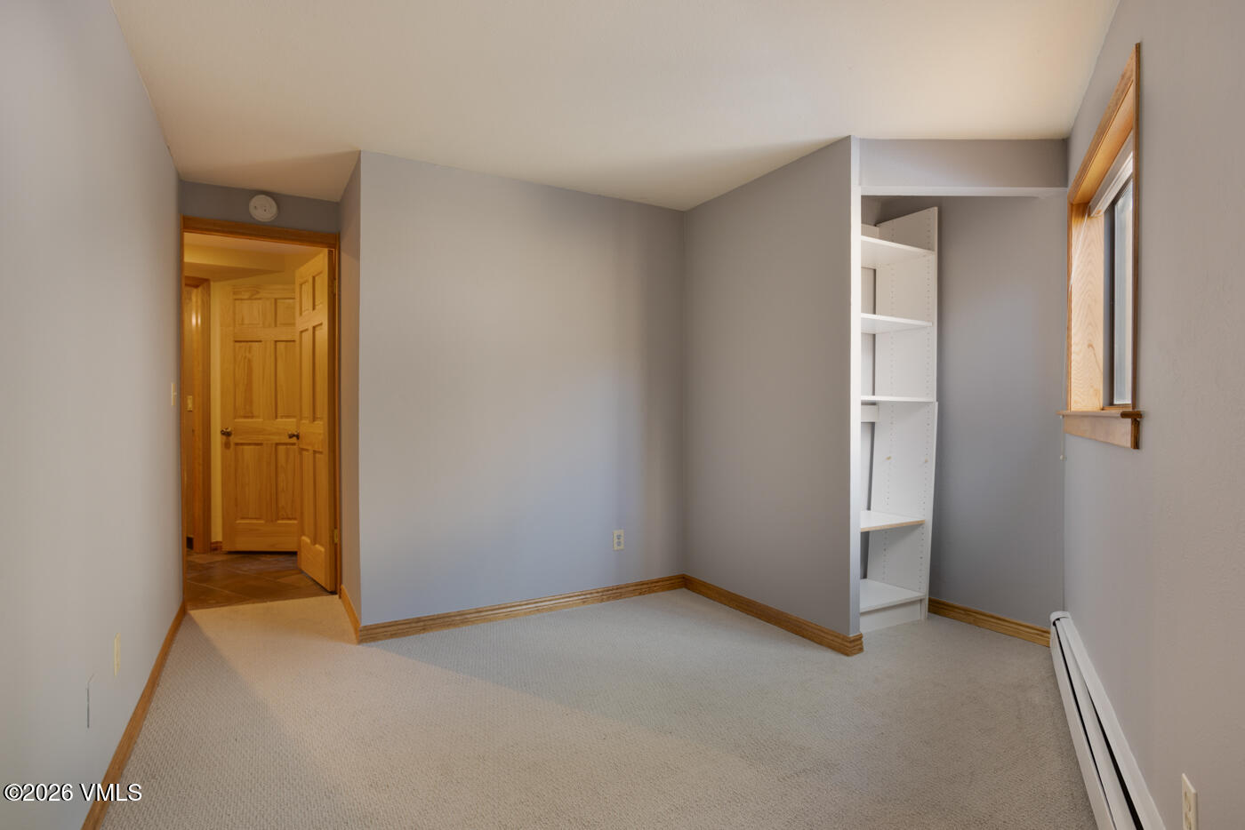 1400 Lions Ridge Loop, Unit A1 Vail, CO 81657 - Photo 25 of 41 an empty room with windows and closet