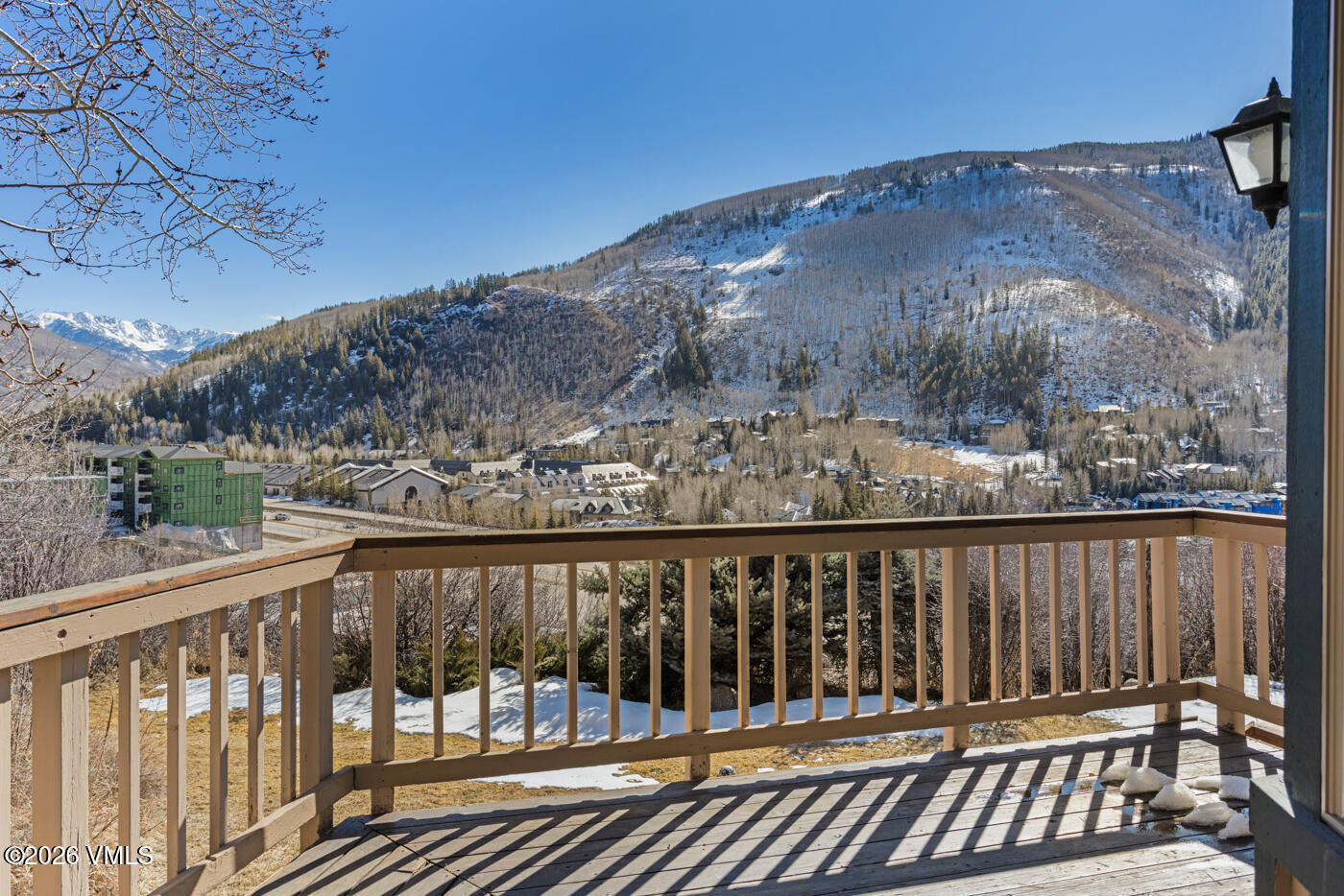 1400 Lions Ridge Loop, Unit A1 Vail, CO 81657 - Photo 31 of 41 a view of a balcony with wooden floor