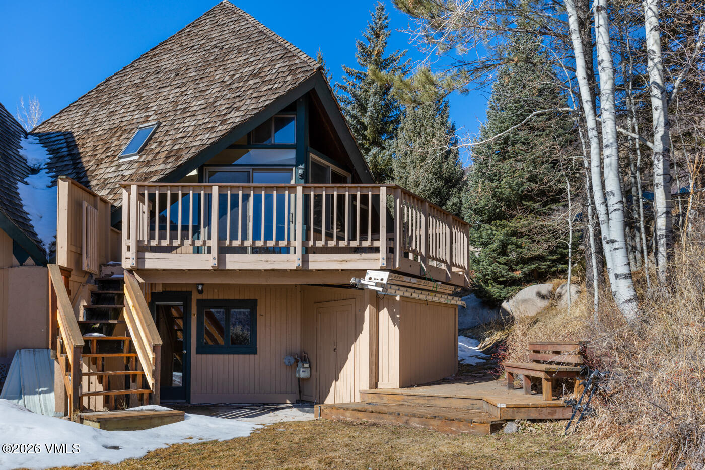 1400 Lions Ridge Loop, Unit A1 Vail, CO 81657 - Photo 33 of 41 a view of roof deck with wooden fence and deck