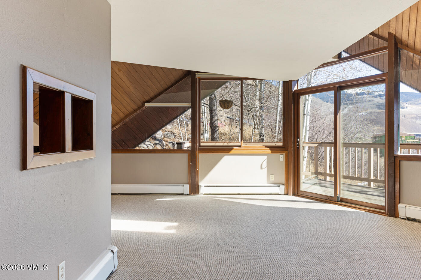 1400 Lions Ridge Loop, Unit A1 Vail, CO 81657 - Photo 4 of 41 a view of an empty room with a window