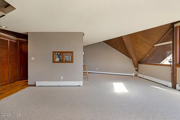 a view of a big room with staircase