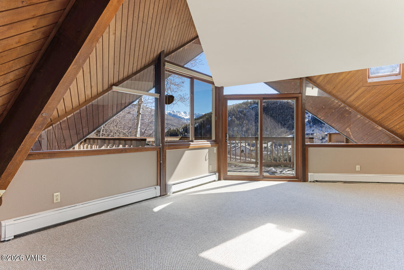 1400 Lions Ridge Loop, Unit A1 Vail, CO 81657 - Photo 8 of 41 a view of a big room with staircase