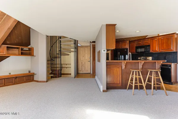 a view of a dining room with furniture