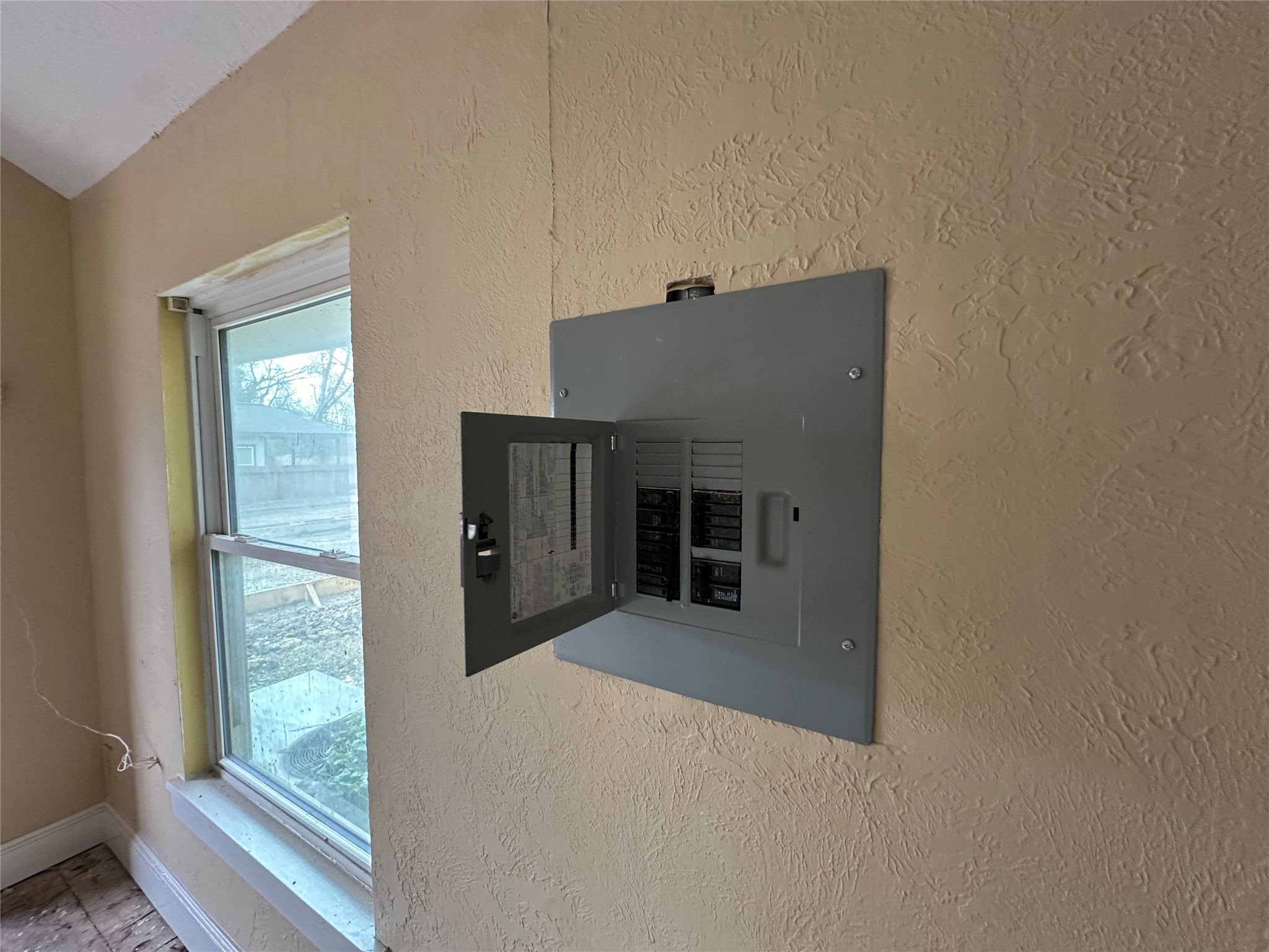 6121 Grace Lane Houston, TX 77021 - Photo 20 of 35 a view of an empty room with a fireplace and a window