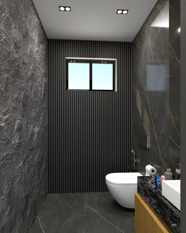 a bathroom with a shower and a tiled wall