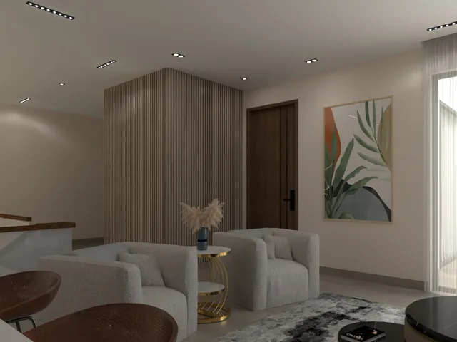 a living room with furniture and potted plant