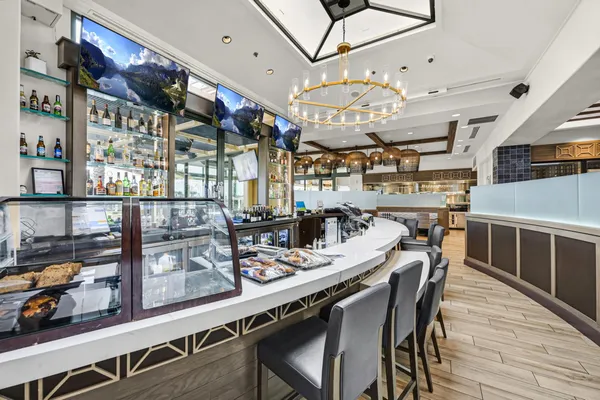 a view of a dining room with furniture