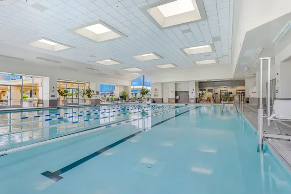 a view of a living room and a kitchen