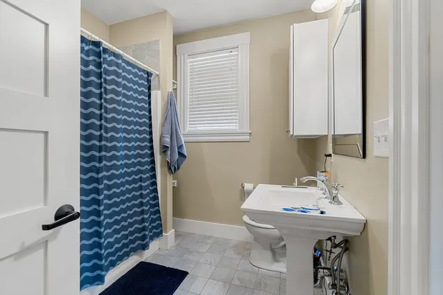 a bathroom with a sink and a toilet