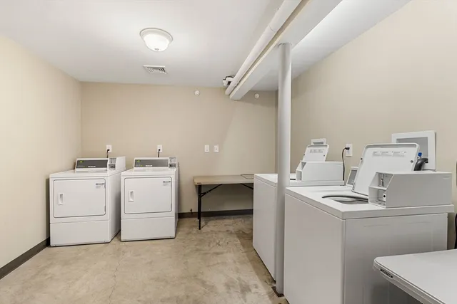 a room with dryer and washer