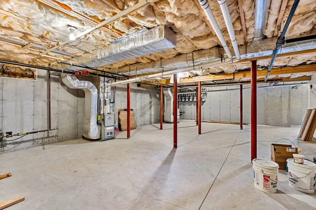 a view of a empty room with wooden floor