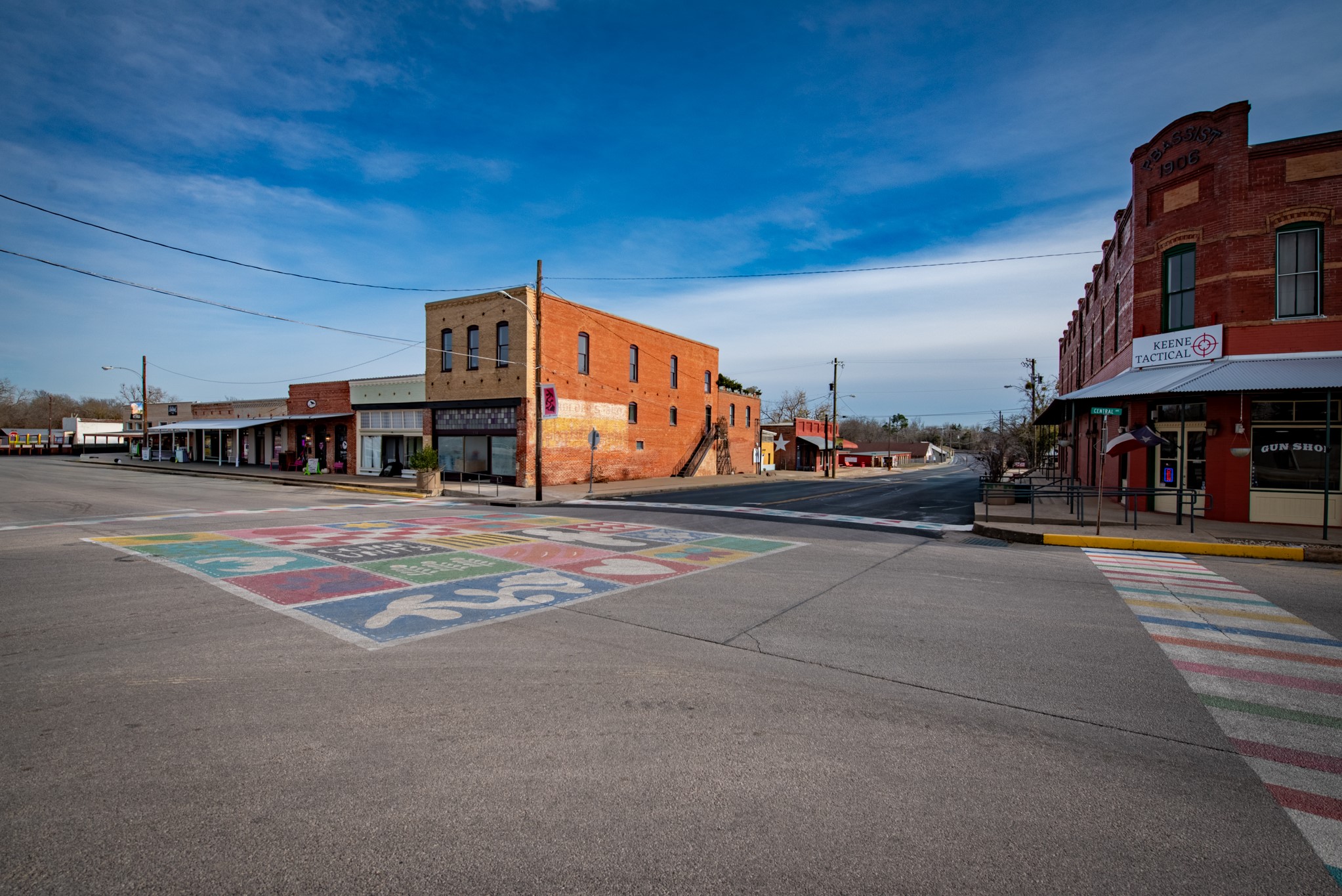 418 South Ave D Elgin, TX 78621 - Photo 16 of 29 a outdoor view of a building with traffic signal lights