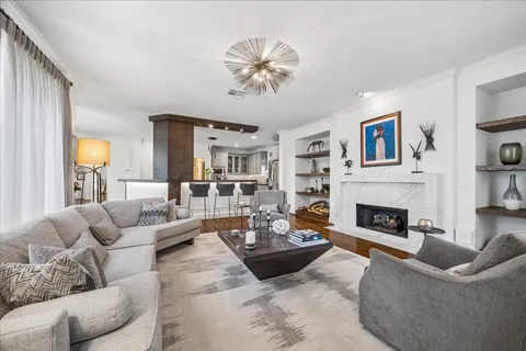 a view of a living room and dining room