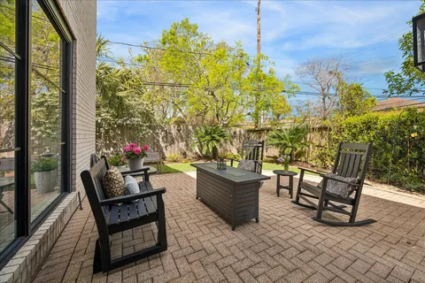 a outdoor living space with furniture and a potted plant