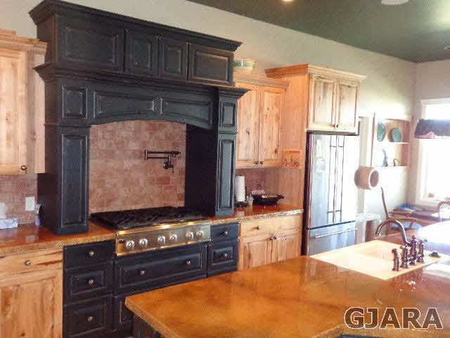 1427 19 Road Fruita, CO 81521 - Photo 15 of 23 a room with table chairs and wooden cabinets
