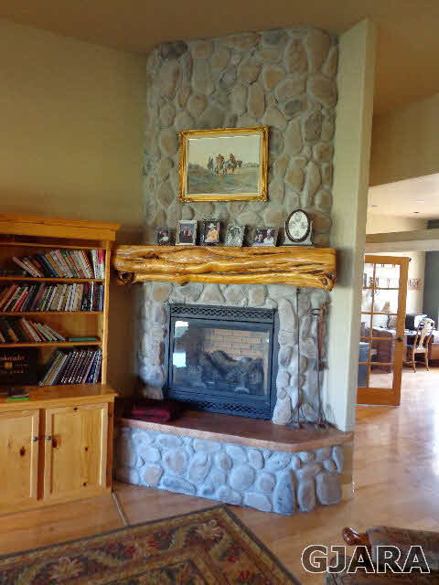 1427 19 Road Fruita, CO 81521 - Photo 20 of 23 a view of a fireplace in a room
