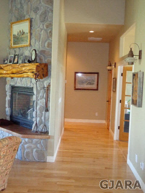 1427 19 Road Fruita, CO 81521 - Photo 22 of 23 a view of a hallway with a fireplace