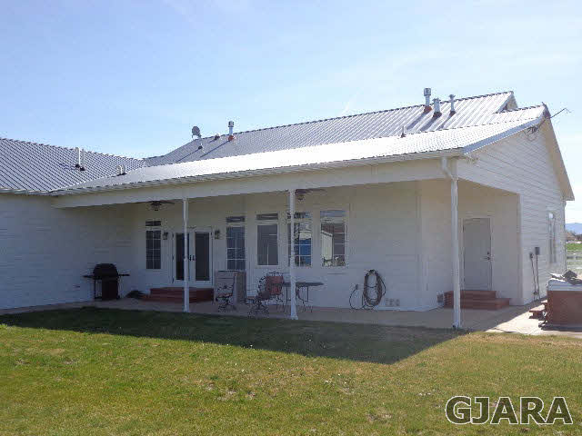 1427 19 Road Fruita, CO 81521 - Photo 6 of 23 a view of a house with a yard