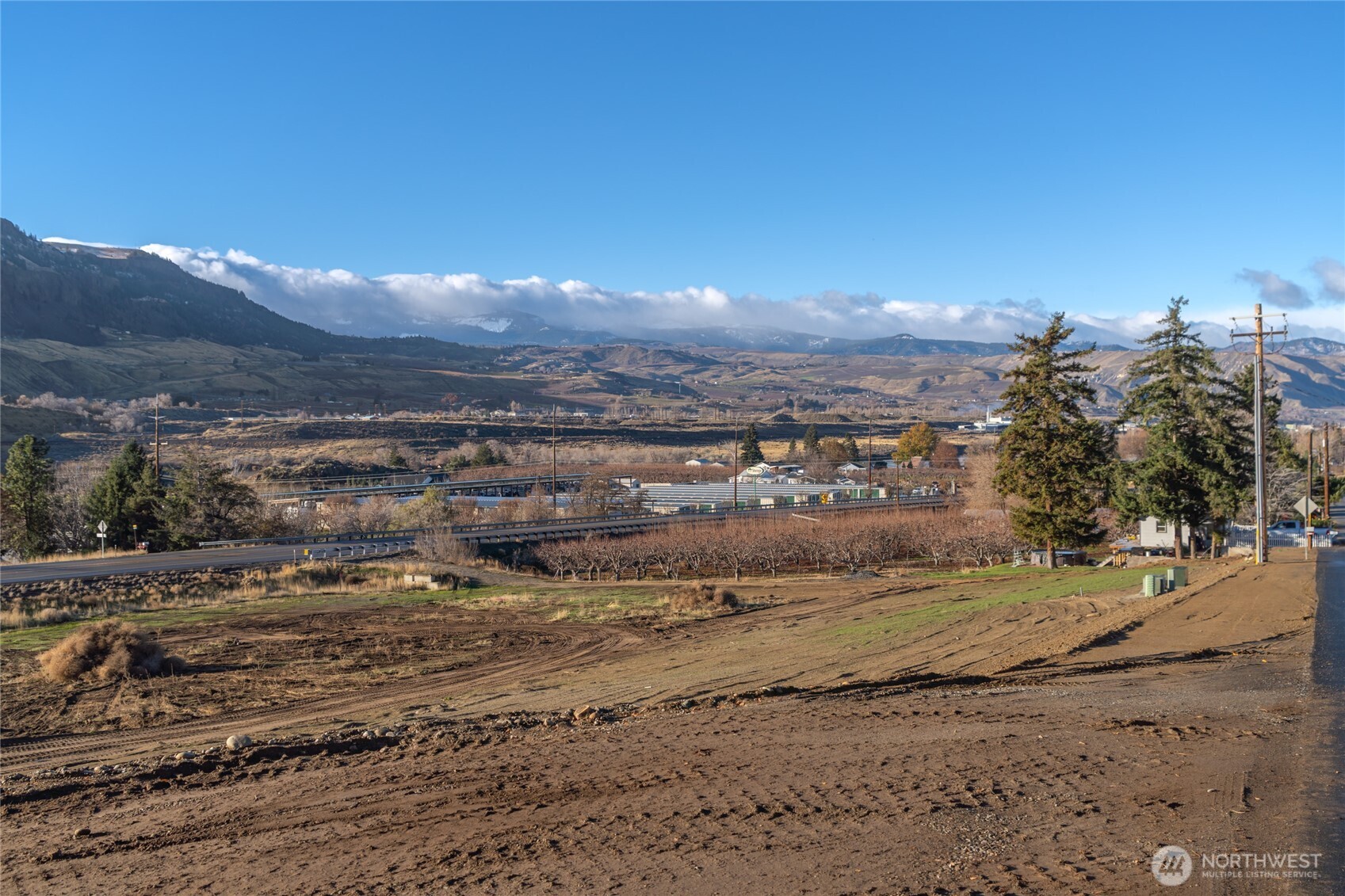0 Riverside Drive Rock Island, WA 98850 - Photo 17 of 31 a view of a town with mountains in the background