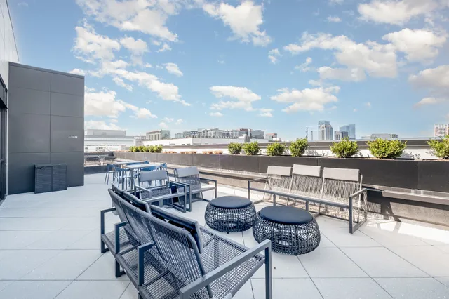 a view of a terrace with furniture