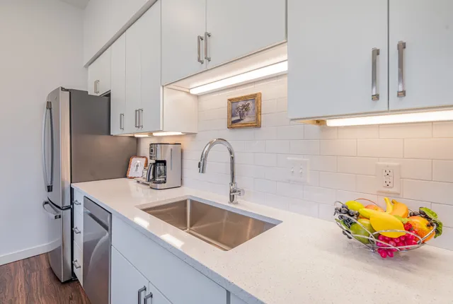 a bedroom with a bed furniture and a window
