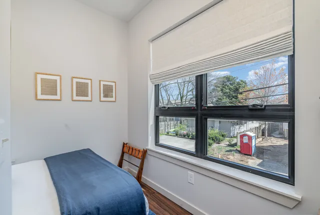 a view of a hallway with washer and dryer