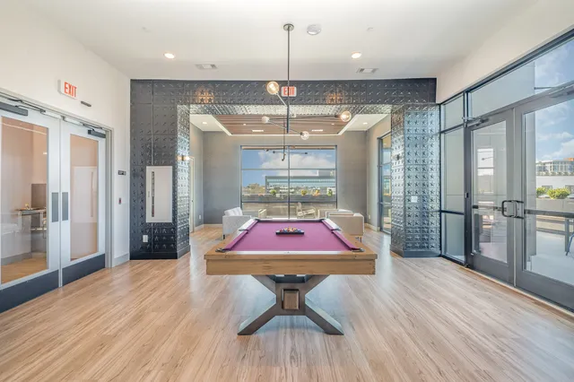 a view of a patio with swimming pool