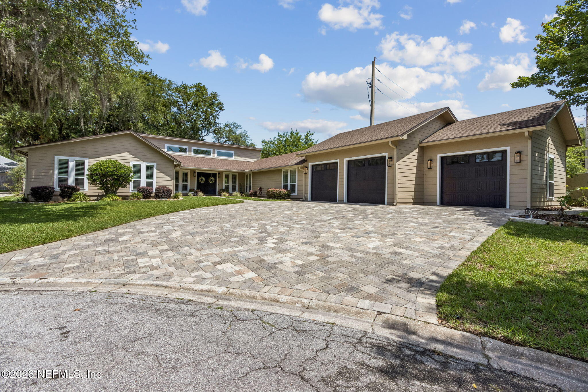 1877 Christopher Point Road South Jacksonville, FL 32217 - Photo 27 of 27 a front view of house with yard and green space