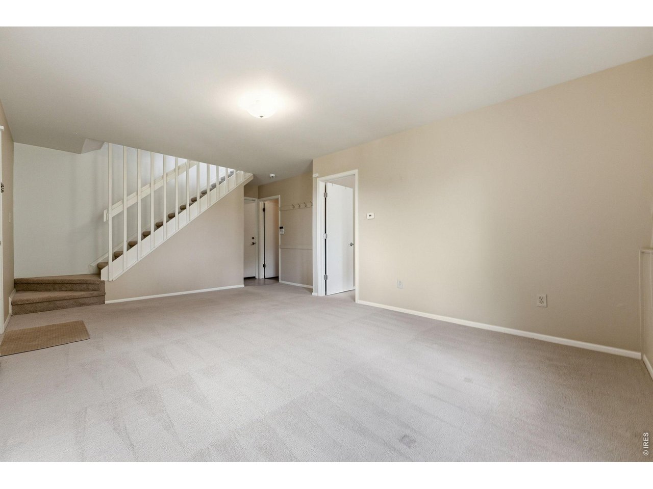 607 North Cedar Brook Road Boulder, CO 80304 - Photo 29 of 36 Lower level flex space has a separate entry, bedroom/office, bathroom, laundry and garage access