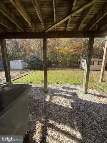 a view of a backyard of a house