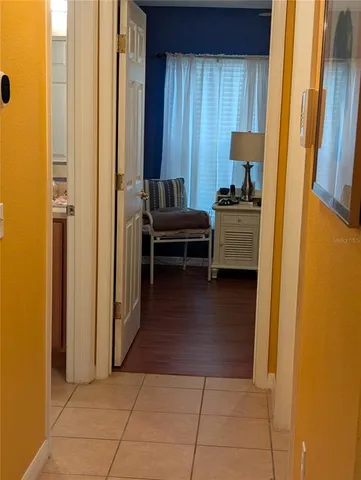 a view of kitchen and utility room with windows