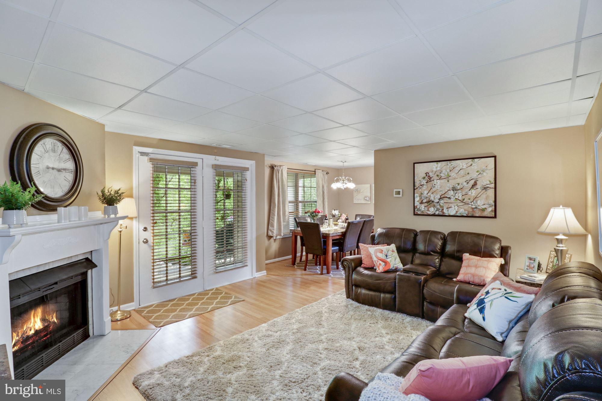 232 Tavistock Cherry Hill, NJ 08034 - Photo 6 of 32 Living Room with Gas Fireplace