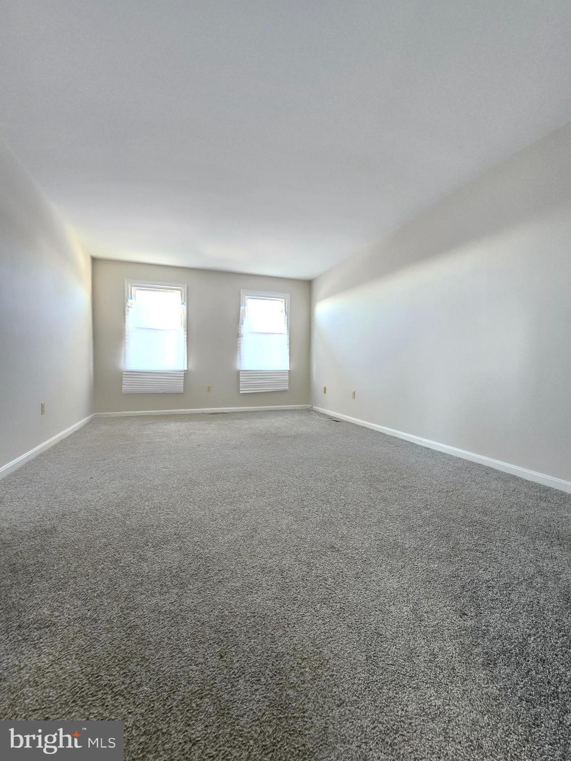 1113 Mirga Circle Baltimore, MD 21207 - Photo 14 of 23 an empty room with windows and closet