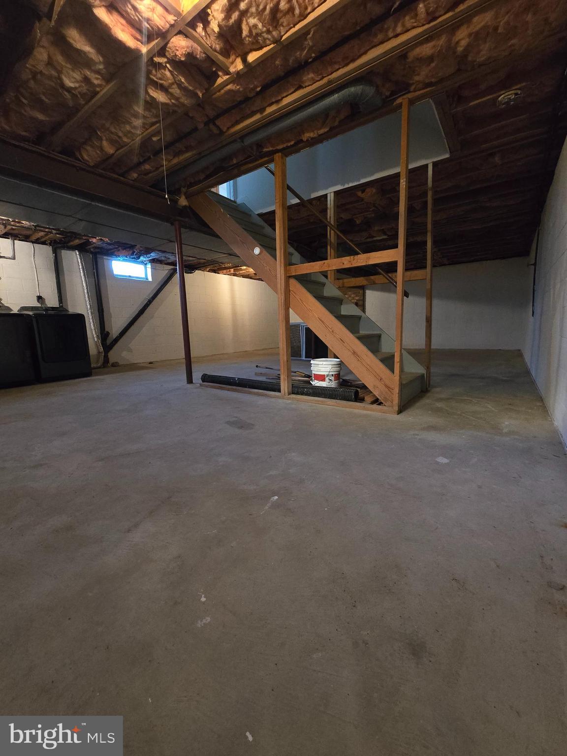 1113 Mirga Circle Baltimore, MD 21207 - Photo 22 of 23 a view of an empty room with wooden floor