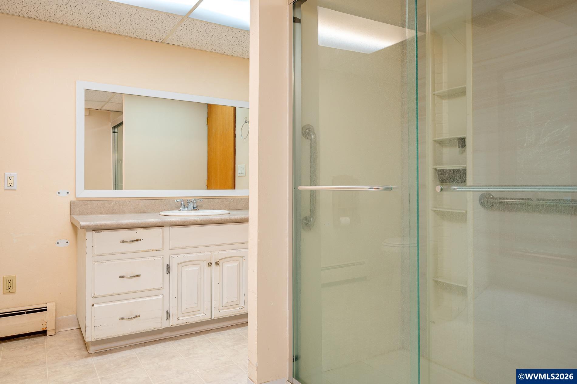 27572 South Kinzy Road Estacada, OR 97023 - Photo 43 of 50 a bathroom with a mirror and a shower