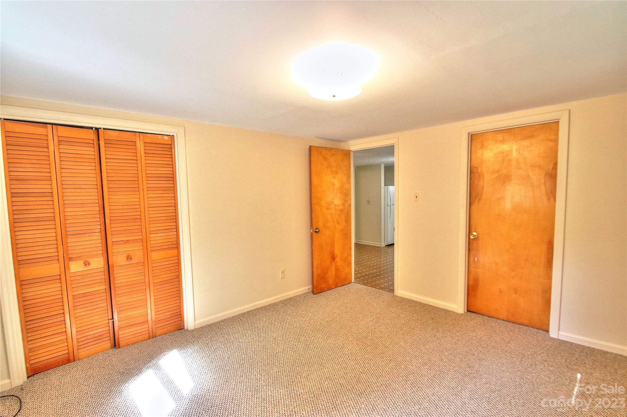 2872 Hyder Mountain Road Clyde, NC 28721 - Photo 11 of 29 a view of an empty room with a window