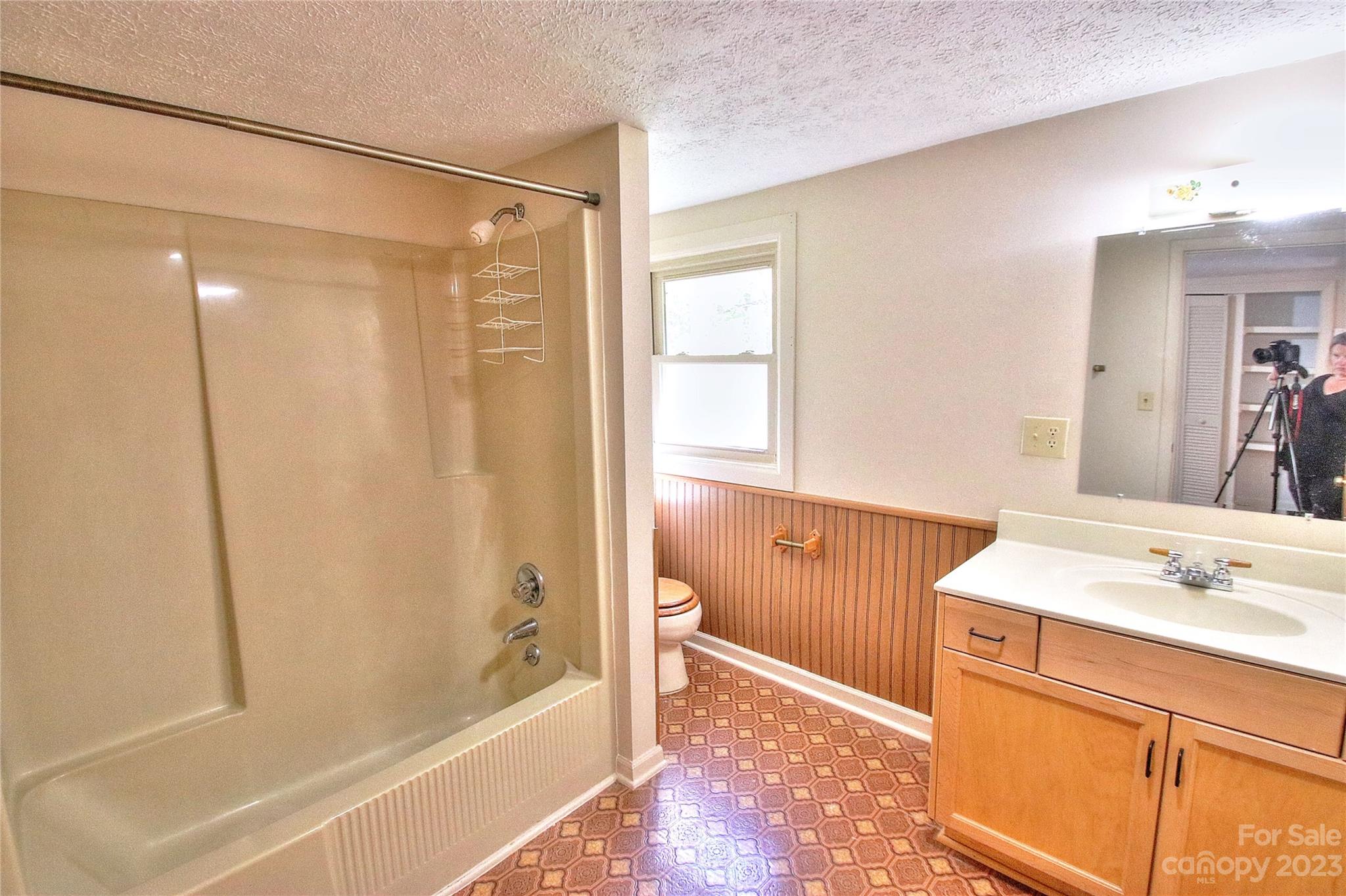 2872 Hyder Mountain Road Clyde, NC 28721 - Photo 13 of 29 a bathroom with a bathtub and a sink