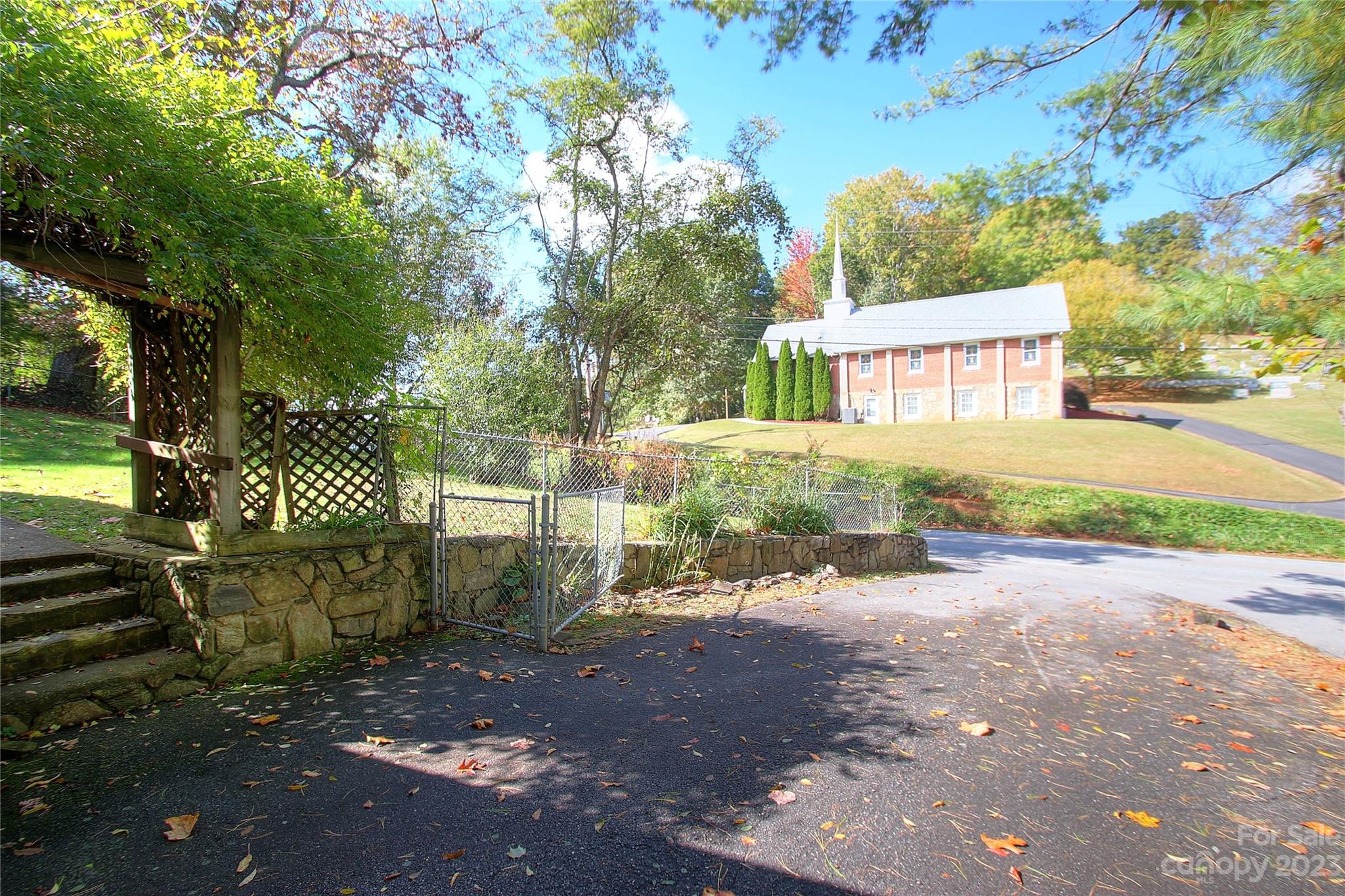 2872 Hyder Mountain Road Clyde, NC 28721 - Photo 16 of 29 a view of a house with a yard