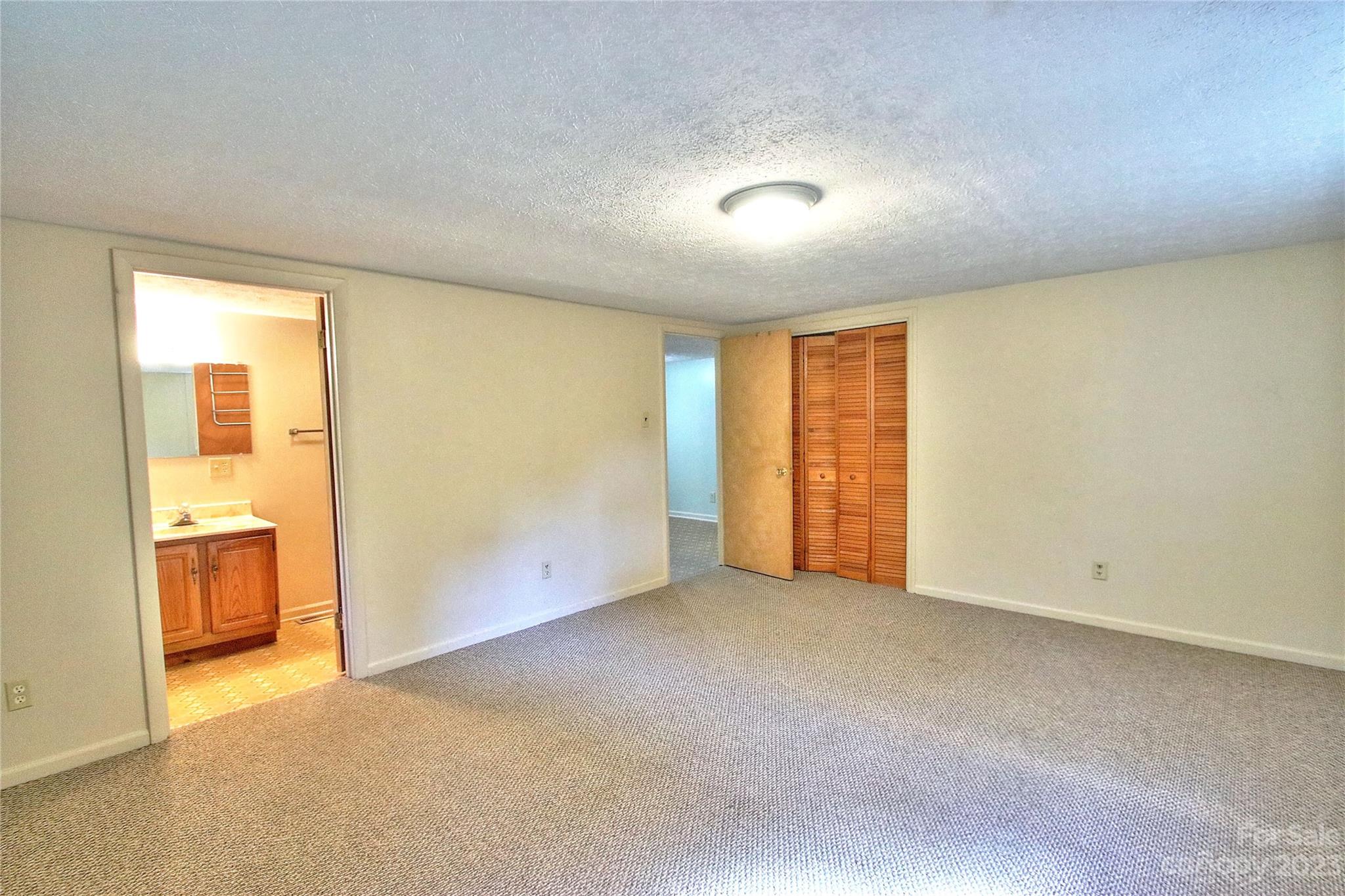 2872 Hyder Mountain Road Clyde, NC 28721 - Photo 10 of 29 an empty room with a window