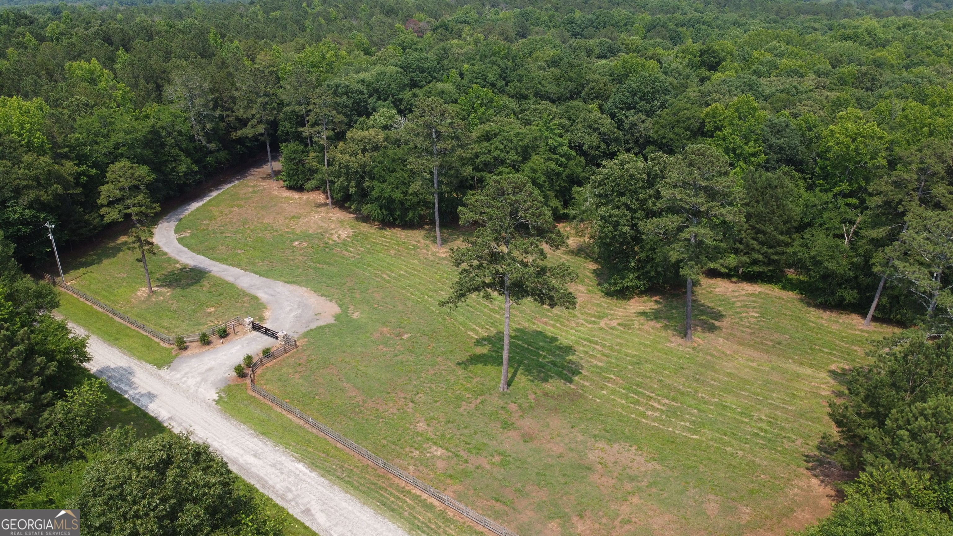 1520 Marshall Wilkes Road Watkinsville, GA 30677 - Photo 15 of 47 an aerial view of residential houses with outdoor space