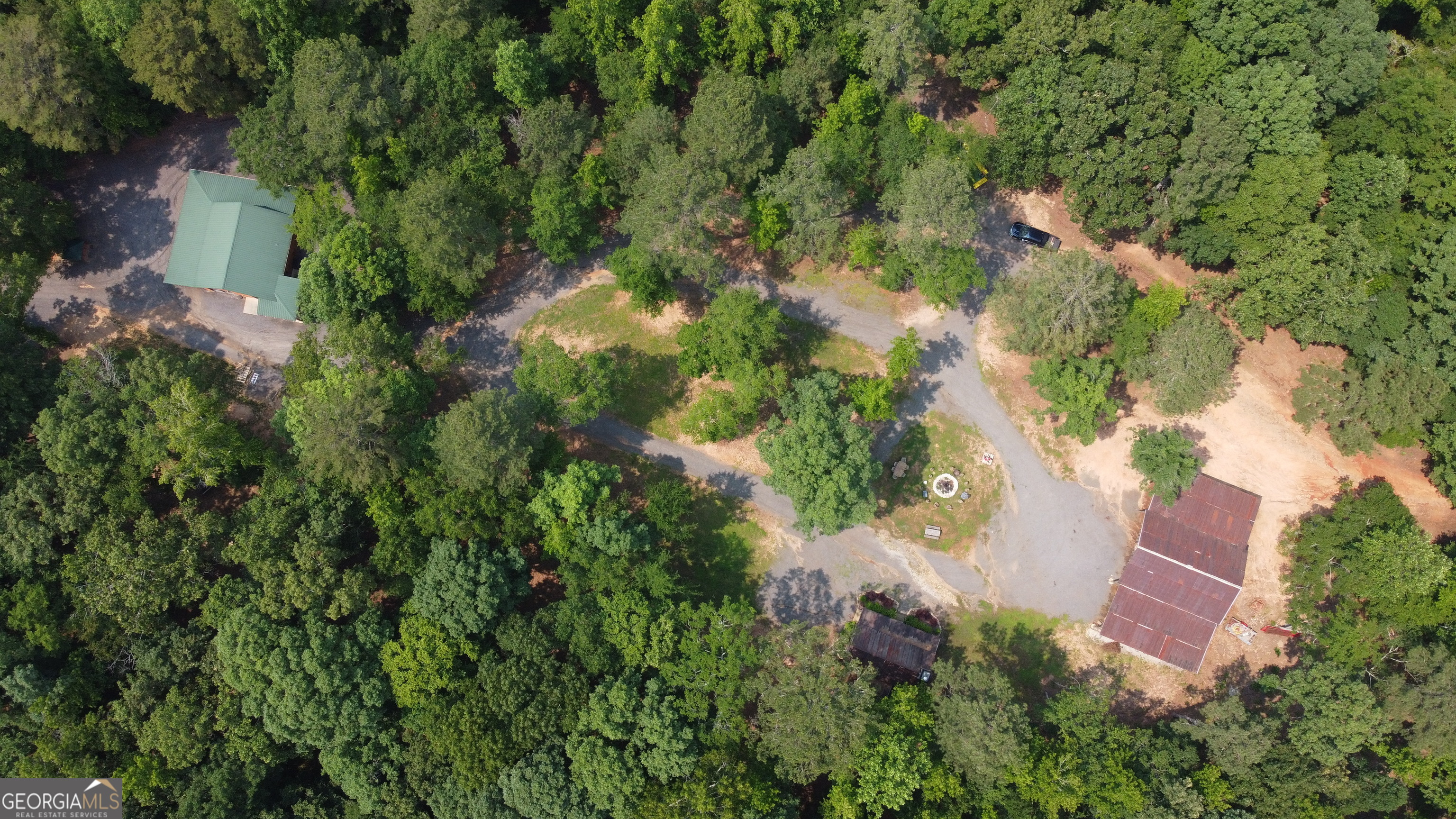 1520 Marshall Wilkes Road Watkinsville, GA 30677 - Photo 19 of 47 an aerial view of residential house with outdoor space and trees all around