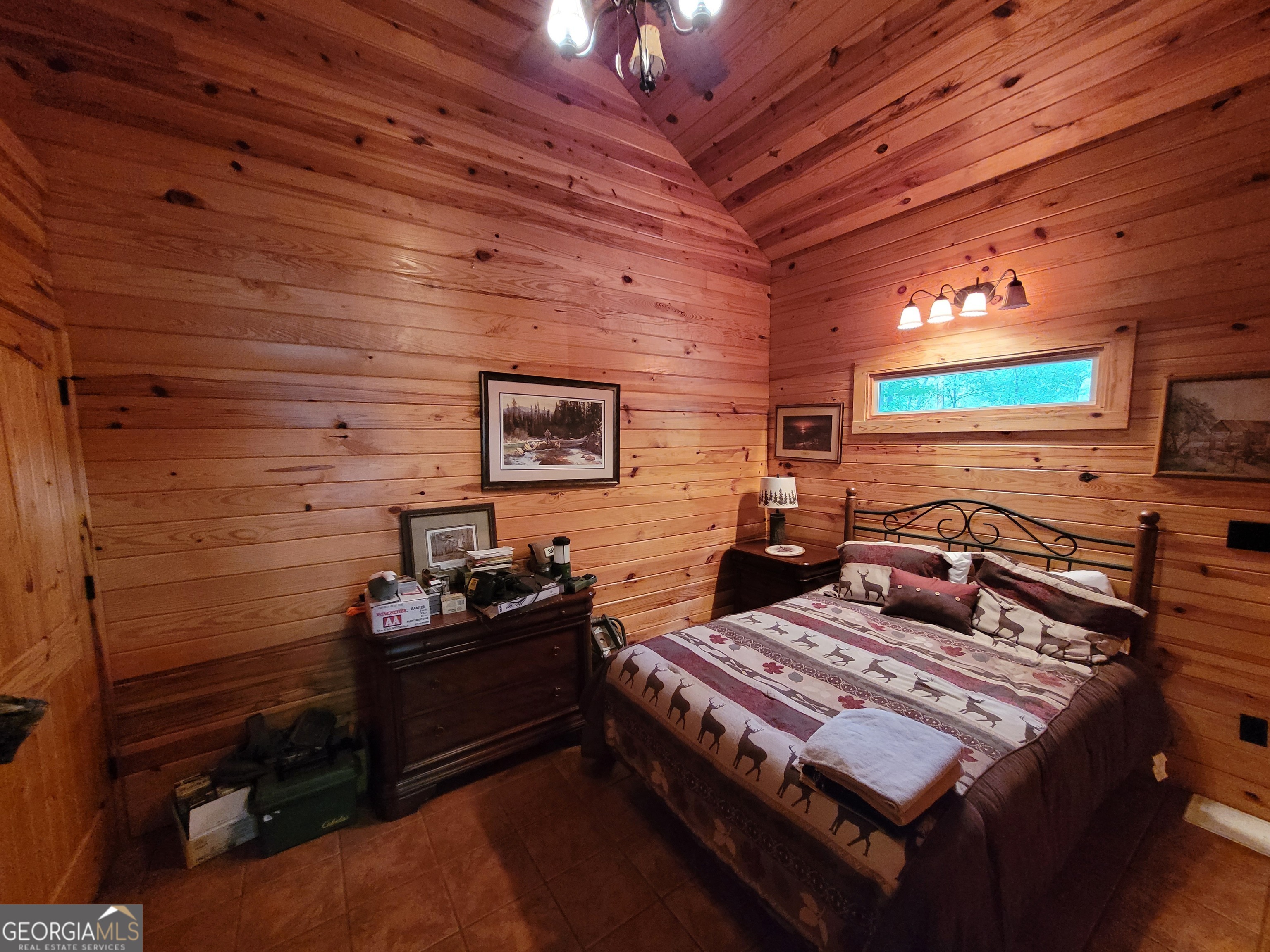 1520 Marshall Wilkes Road Watkinsville, GA 30677 - Photo 28 of 47 a bedroom with a bed and a flat screen tv