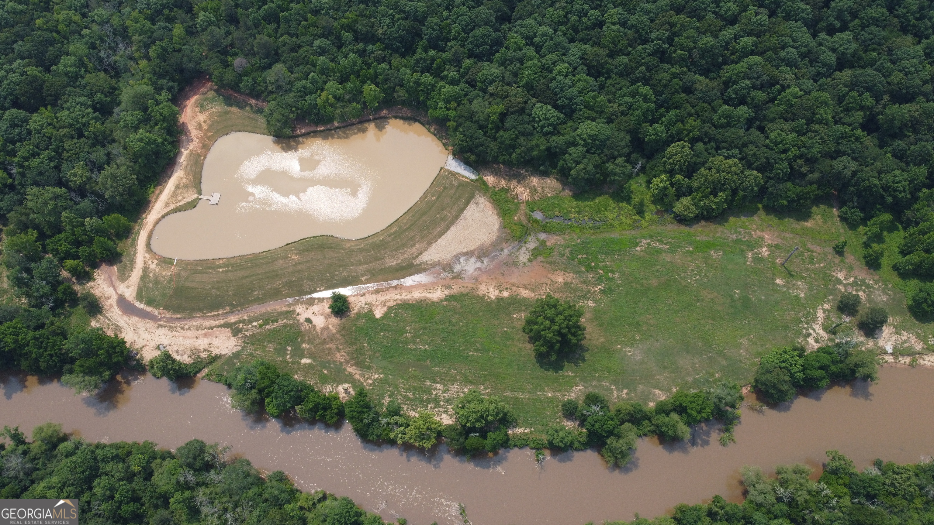 1520 Marshall Wilkes Road Watkinsville, GA 30677 - Photo 3 of 47 an aerial view of a house with a yard and lake view