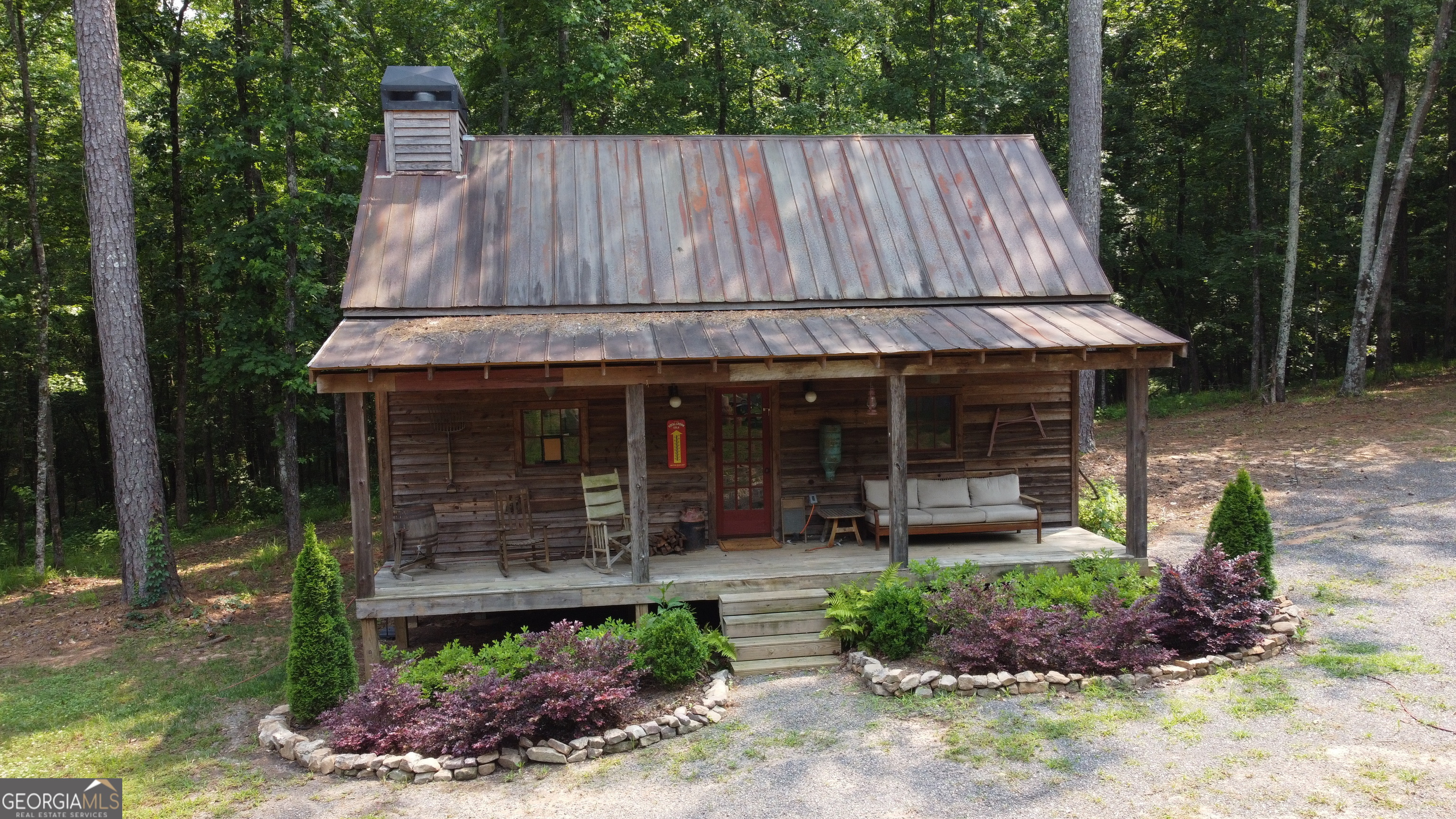 1520 Marshall Wilkes Road Watkinsville, GA 30677 - Photo 32 of 47 a front view of a house with garden