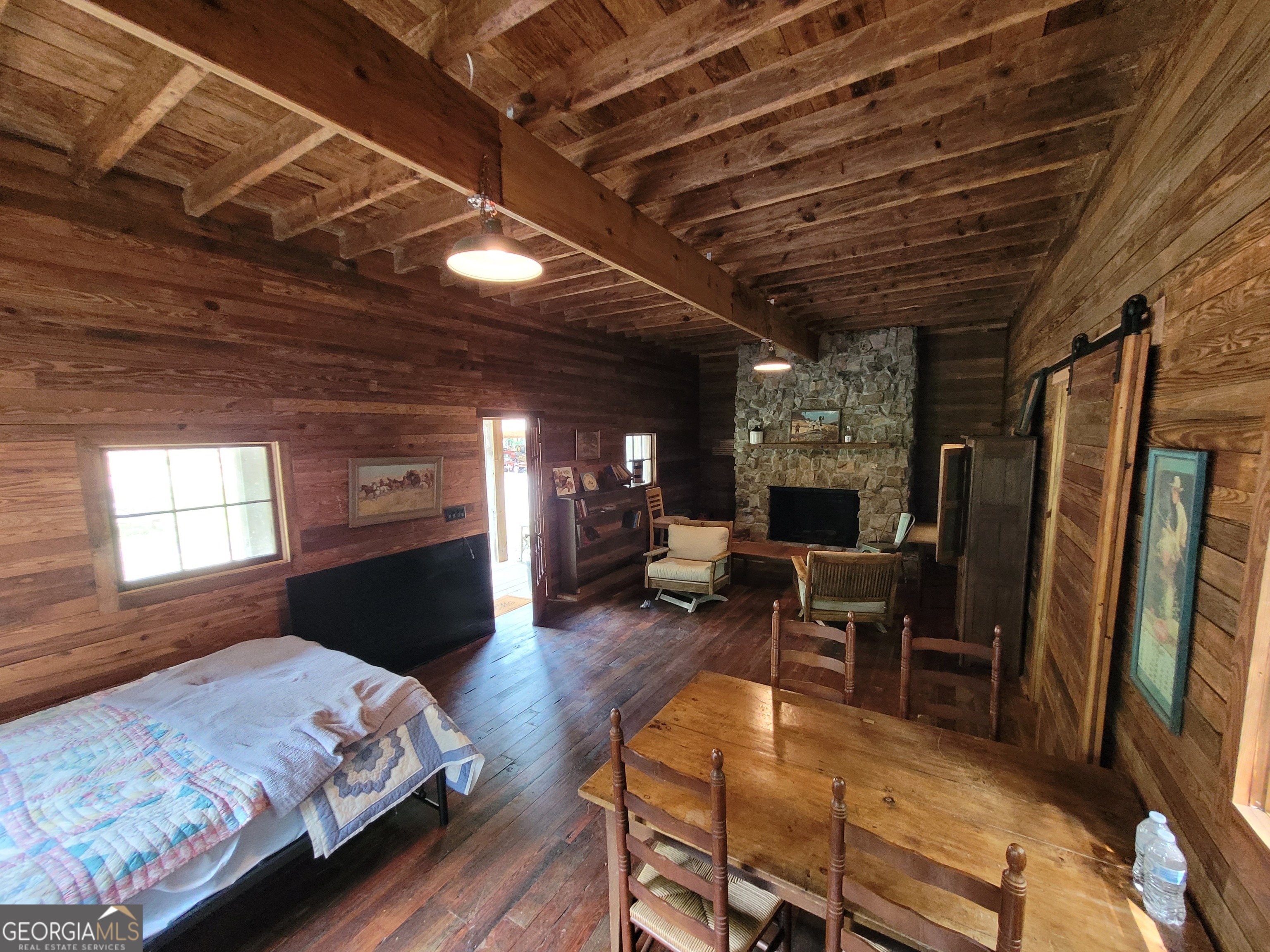 1520 Marshall Wilkes Road Watkinsville, GA 30677 - Photo 34 of 47 a spacious bedroom with a bed and a table
