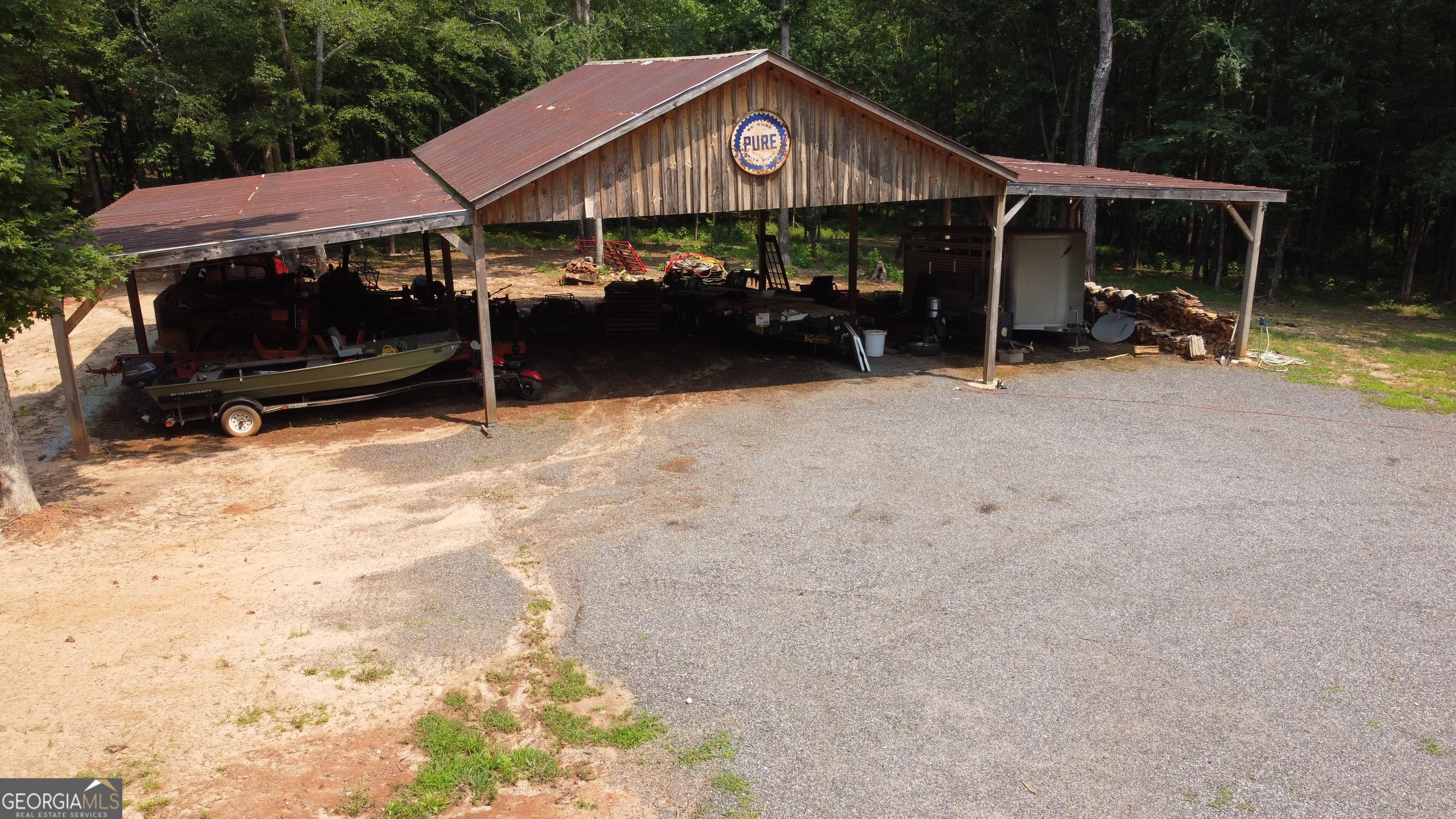 1520 Marshall Wilkes Road Watkinsville, GA 30677 - Photo 37 of 47 a view of a house with backyard and sitting area