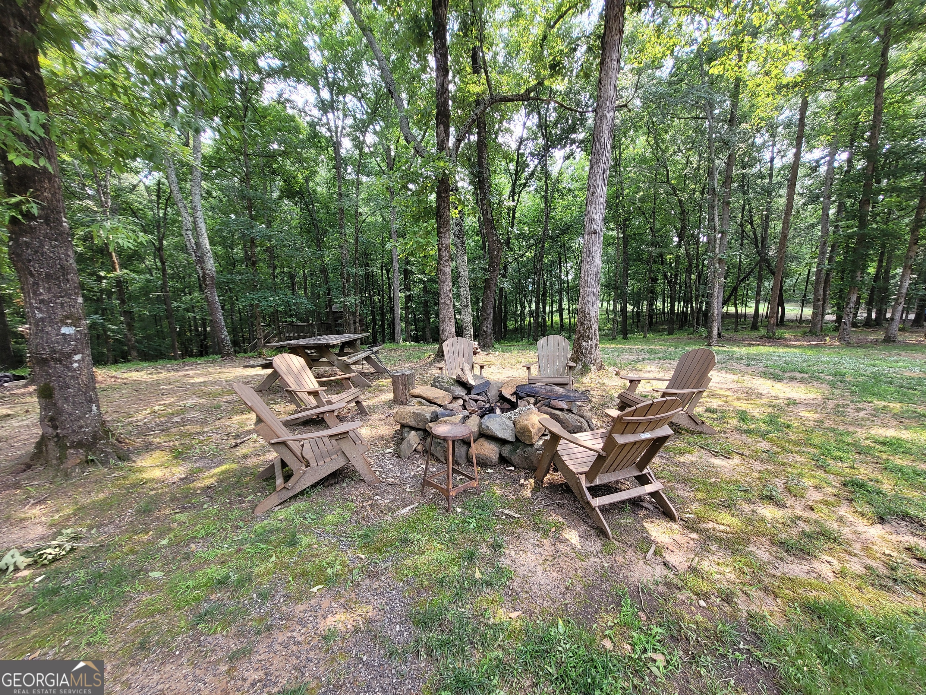 1520 Marshall Wilkes Road Watkinsville, GA 30677 - Photo 38 of 47 a view of an outdoor sitting area with chairs