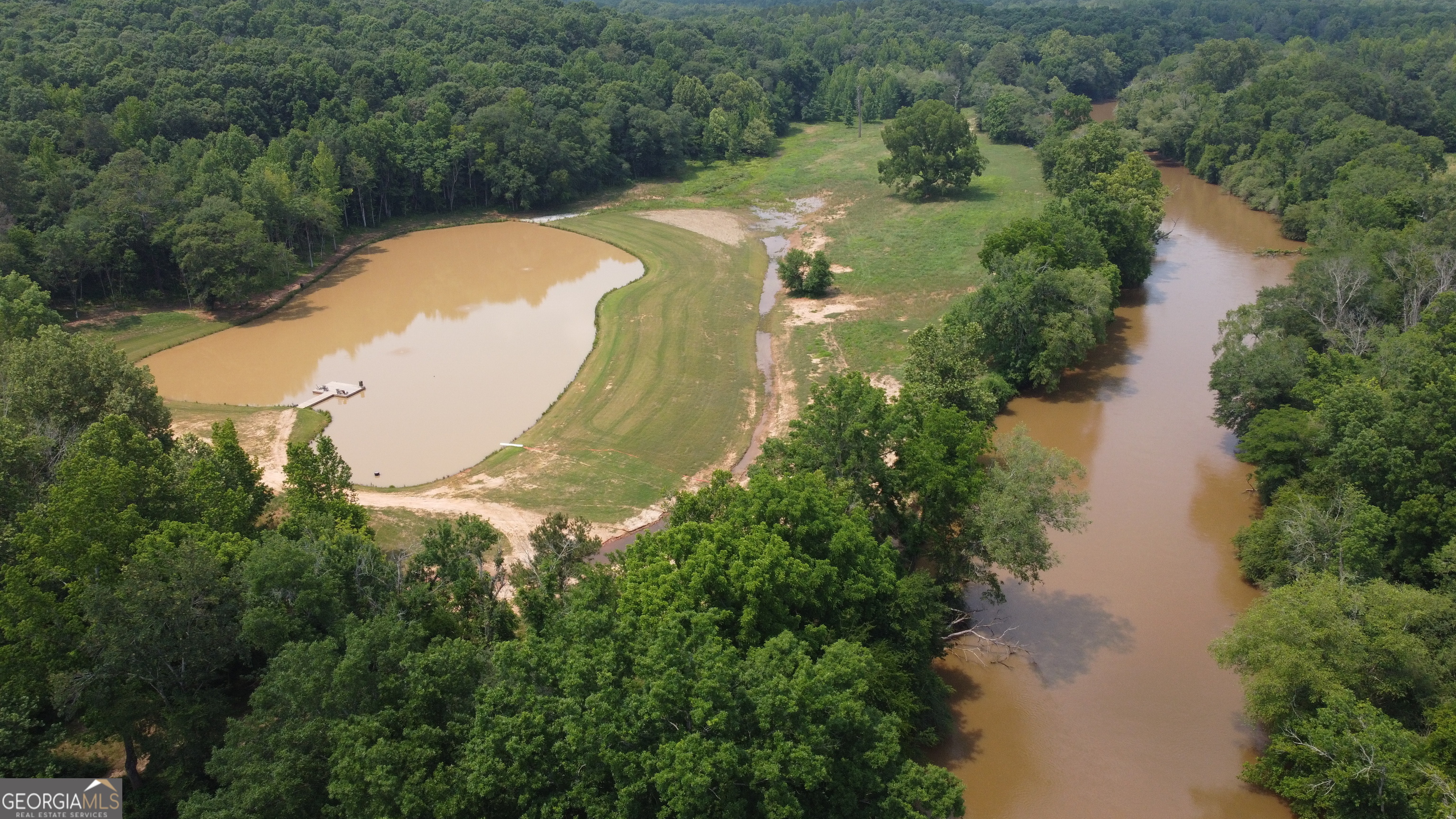 1520 Marshall Wilkes Road Watkinsville, GA 30677 - Photo 4 of 47 an aerial view of lake residential house with outdoor space and trees around