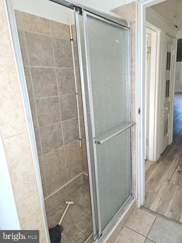 1648 Columbia Road Northwest, Unit B Washington, DC 20009 - Photo 12 of 15 a bathroom with a glass door shower
